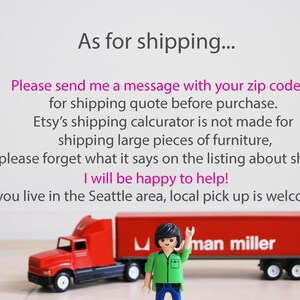 May include: A red toy semi-truck with a matching trailer, featuring the text "man miller." A small figure in a green shirt and black pants stands in front of the trailer. Text above reads "As for shipping..." and other shipping information.