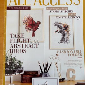 May include: The December 2018 issue of All Access magazine features a cover with the text Take Flight with Abstract Birds, Starry Stitches to life in Constellations, and Fashionably Folded. It displays framed bird embroidery, a succulent, pencils, and an Anita Goodesign 15 Years logo.