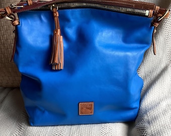 Dooney & Bourke Smooth Leather Shoulder Bag.  Very Roomy And Organized.  Sky Blue Color.