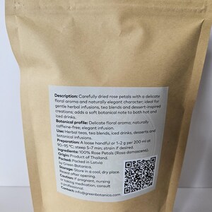 May include: A brown paper bag containing dried rose petals. The label describes the product as having a delicate floral aroma, suitable for herbal infusions and iced drinks. The bag includes a QR code and contact information.