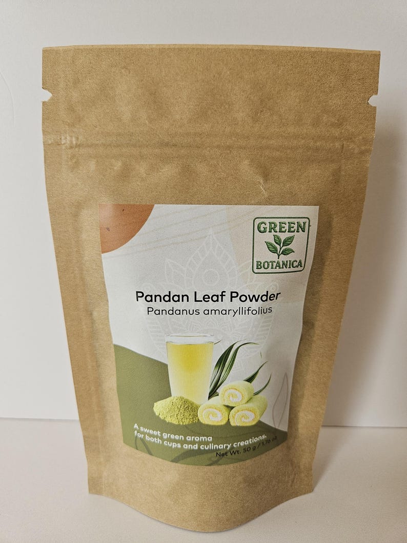 May include: A brown paper pouch of Green Botanica Pandan Leaf Powder, Pandanus amaryllifolius. The label features a glass of green liquid, a pile of green powder, and two green-swirled rolls, with the text: A sweet green aroma for both cups and culinary creations. Net Wt. 50 g / 1.76 oz.