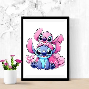 May include: A framed print of the cartoon characters Stitch and Angel. Stitch is blue, and Angel is pink, both with large eyes and ears. The print is in a black frame and is set against a white background. A small vase of pink flowers sits to the left.