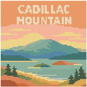 May include: A cross-stitch landscape featuring Cadillac Mountain. The design includes a teal mountain, a lake, and a colorful sky with the words "CADILLAC MOUNTAIN" in white block letters. The color palette includes shades of orange, pink, yellow, and green.