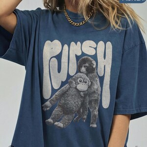 Baby Monkey Punch Shirt, Baby Monkey Punch Sweatshirt, Funny Monkey Shirt, Viral Monkey Meme Shirt, Trending Monkey Sweatshirt, Cute Monkey Graphic Tee, Cartoon Monkey Sweatshirt, Retro Monkey Shirt, Kawaii Monkey Tee, Funny Animal Sweatshirt, Meme Graphic Shirt, Instagram Viral Shirt, TikTok Trending Sweatshirt, Streetwear Monkey Shirt, Aesthetic Graphic Sweatshirt, Oversized Monkey Tee, Unisex Trendy Sweatshirt, Youth Monkey Shirt, Pop Culture Meme Tee, Funny Gift Sweatshirt