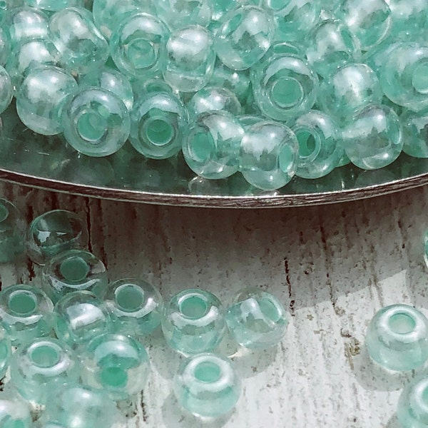 6/0 (4.1mm) | Crystal/Pastel Aqua Color Lined | Czech Glass Seed Beads