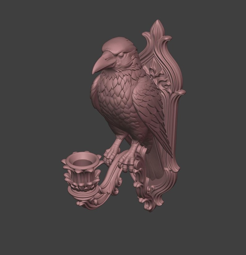 May include: A mauve-colored wall sconce featuring a sculpted raven perched atop a candle holder. The piece is mounted on an ornate, vertically elongated backplate with intricate relief detailing, showcasing a bird with textured feathers.
