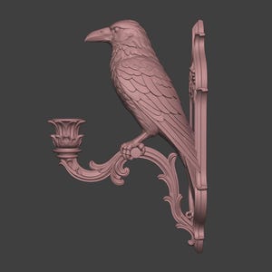 May include: A dusty rose wall-mounted candle holder featuring a sculpted raven perched on a curved, ornate bracket. The bird is depicted in profile with detailed feather textures, and the candle cup has a fluted, petal-like rim design.