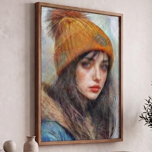 Puede incluir: Una impresión artística enmarcada que muestra el retrato de una persona con un gorro de punto naranja brillante con pompón. El sujeto tiene el cabello largo y oscuro y viste una chaqueta azul con cuello de piel, en un estilo texturizado de boceto.