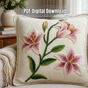 May include: Cream-colored decorative pillow with a floral design. The pillow features embroidered pink lilies with green stems and leaves. The text "PDF Digital Download" is at the top.