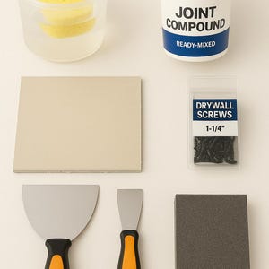 May include: An assortment of drywall tools and supplies, including a container of joint compound, drywall screws, two putty knives, a sanding sponge, and a container of water with sponges.