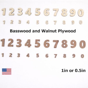 May include: A collection of wooden numbers zero through nine in two sizes, 1 inch or 0.5 inch, crafted from light-colored basswood and dark-colored walnut plywood. The set includes large and small digits arranged in rows with the text Basswood and Walnut Plywood.