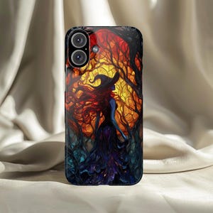 May include: A phone case featuring a witch in a forest scene. The witch is silhouetted against a fiery orange and yellow background, with long red hair and a black hat. The case has a dark, textured border.