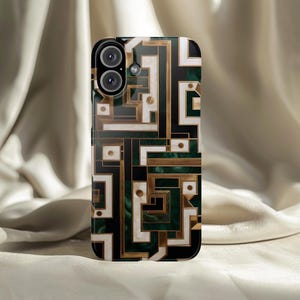 May include: A smartphone case with a geometric design. The case features a pattern of gold, black, white, and green shapes. The design is intricate and appears to be made of multiple layers. The case has a glossy finish and covers the back and sides of the phone.