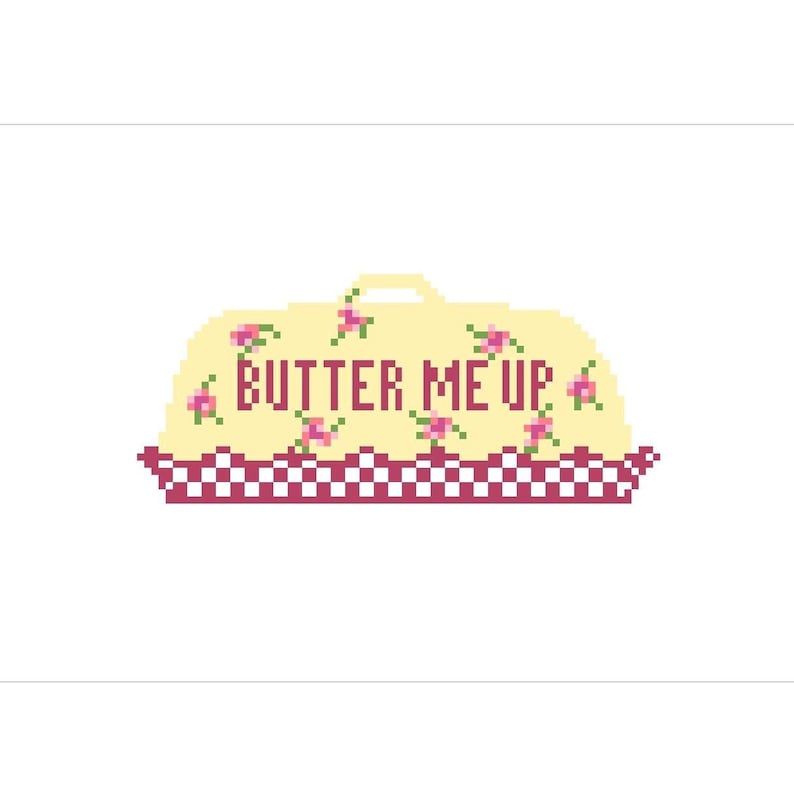 K&ouml;nnte beinhalten: Pixelige Illustration eines gelben Kuchens mit Griff und dem Text "BUTTER ME UP" in Braun. Der Kuchen ist mit rosa Blumen verziert und steht auf einer rot-wei&szlig; karierten Basis.