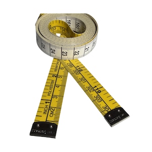 May include: A yellow and white measuring tape, partially rolled, with black markings for inches and centimeters. The tape is made of polyester and has the text "Reinforce" printed on it. The tape measures up to 160 inches.