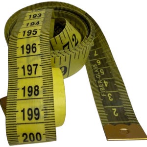 May include: A yellow and black fiber-glass measuring tape, coiled and partially unrolled. The tape shows measurements in inches, with numbers up to 200. The tape is used for measuring fabric, sewing, and other crafts.