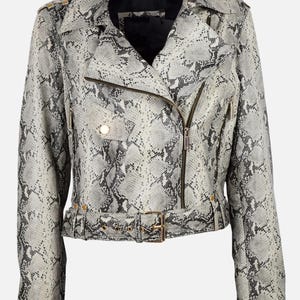 May include: A snakeskin-effect biker jacket in grey and white. The jacket has a notched collar, an asymmetrical zip, and a belted waist. Gold-coloured hardware, including zips and snaps, adds detail to the design.