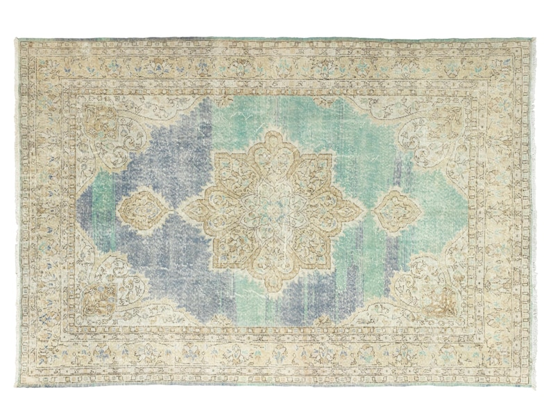 Hand-knotted vintage Oushak rug 7.2x10.3 ft aqua blue and sand beige with central medallion, styled for coastal living room or serene bedroom setting.