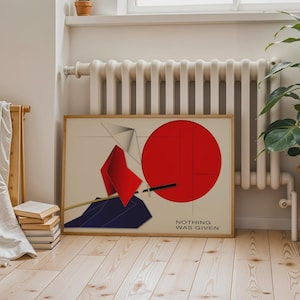 Op de afbeelding: Ingelijste kunstdruk met een abstract ontwerp. Het heeft een grote rode cirkel, geometrische vormen en de tekst "NOTHING WAS GIVEN". Het kunstwerk heeft een minimalistische stijl met rode, blauwe en beige tinten.