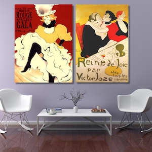 May include: Two framed art prints with vintage advertisements. One shows a woman in a yellow dress with the text "MOULIN ROUGE GALA." The other depicts a couple with the text "Reine de Joie." The prints are displayed above a white table and chairs.