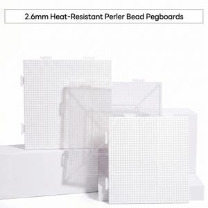 May include: A set of clear, square 2.6mm heat-resistant Perler bead pegboards featuring interlocking tabs on the edges. The boards are arranged in a layered composition, displaying a grid of small, evenly spaced pegs for crafting designs.