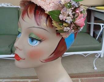 vintage women's cocktail hat flowers bouquet cellophane Pink millinery 1950's retro