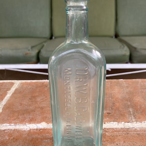 Antique medicine bottle Dr WB Caldwell&#39;s Monticello Illinois aqua decorative collectible glass