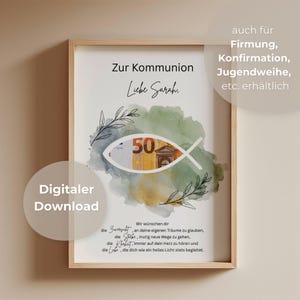 May include: A framed print with the text "Zur Kommunion Liebe Sarah" and a watercolor fish design with a 50 Euro bill inside. The print also includes the text "Digitaler Download" and other German text. The frame is light brown.