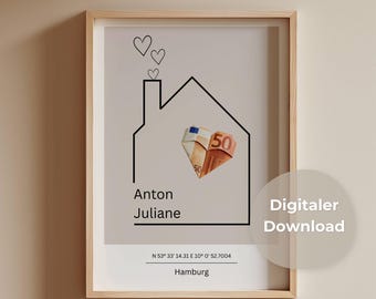 May include: A framed print featuring a black line drawing of a house with three hearts above the chimney. Inside the house is a heart folded from a 50 Euro banknote. Text includes the names Anton and Juliane, coordinates, and Hamburg.