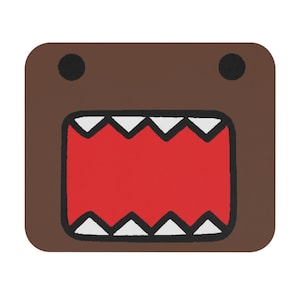 May include: Brown square-shaped graphic featuring a cartoon character with a large red mouth, white teeth, and two black eyes. The character has a simple, expressive design.