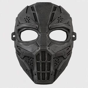 May include: A matte black tactical face mask featuring a segmented, armored design with large eye openings, a central grid-patterned mouth guard, and multiple small circular ventilation perforations across the forehead and cheek areas.