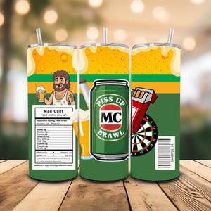 May include: A set of three stainless steel tumblers with straws. Each tumbler features a different design: a cartoon man with a beer, a beer can with the text "Piss Up Brawl", and a dartboard with a pack of cigarettes.