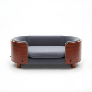 May include: A modern dog bed with a gray cushion and back, framed by curved, dark wood panels. The bed has a low profile with rounded corners and short, cylindrical legs. The overall design is minimalist and stylish.