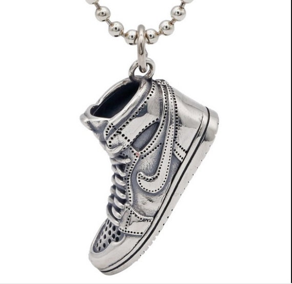Sterling chain with charm holder and five enameled sneakers