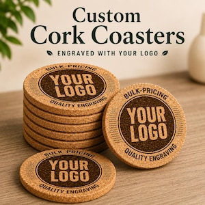 May include: A stack of round light brown cork coasters and one individual coaster placed in front. Each coaster features a dark brown circular center with the text YOUR LOGO, BULK-PRICING, and QUALITY ENGRAVING printed in a bold sans-serif font.