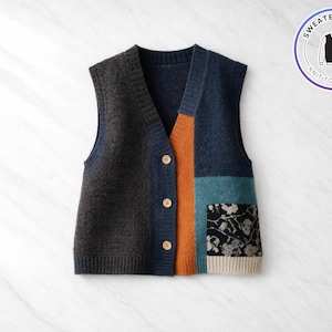 May include: A white ceramic mug with a black handle and the text "But First, Coffee" in a handwritten style. The mug is on a white surface. The mug is approximately 4 inches tall.