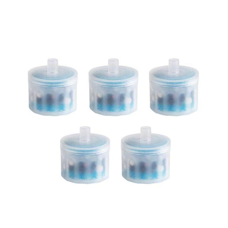 May include: Five small, cylindrical filters with a light blue casing and a central, vertical tube. The filters have a translucent appearance, revealing a blue and white internal structure. The filters are arranged against a white background.