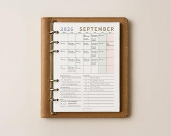 May include: A tan leather ring-bound planner open to a September 2026 monthly calendar page. The page features a grid layout with columns for days of the week, a monthly focus section, key dates, top priorities, and a notes area with printed text.