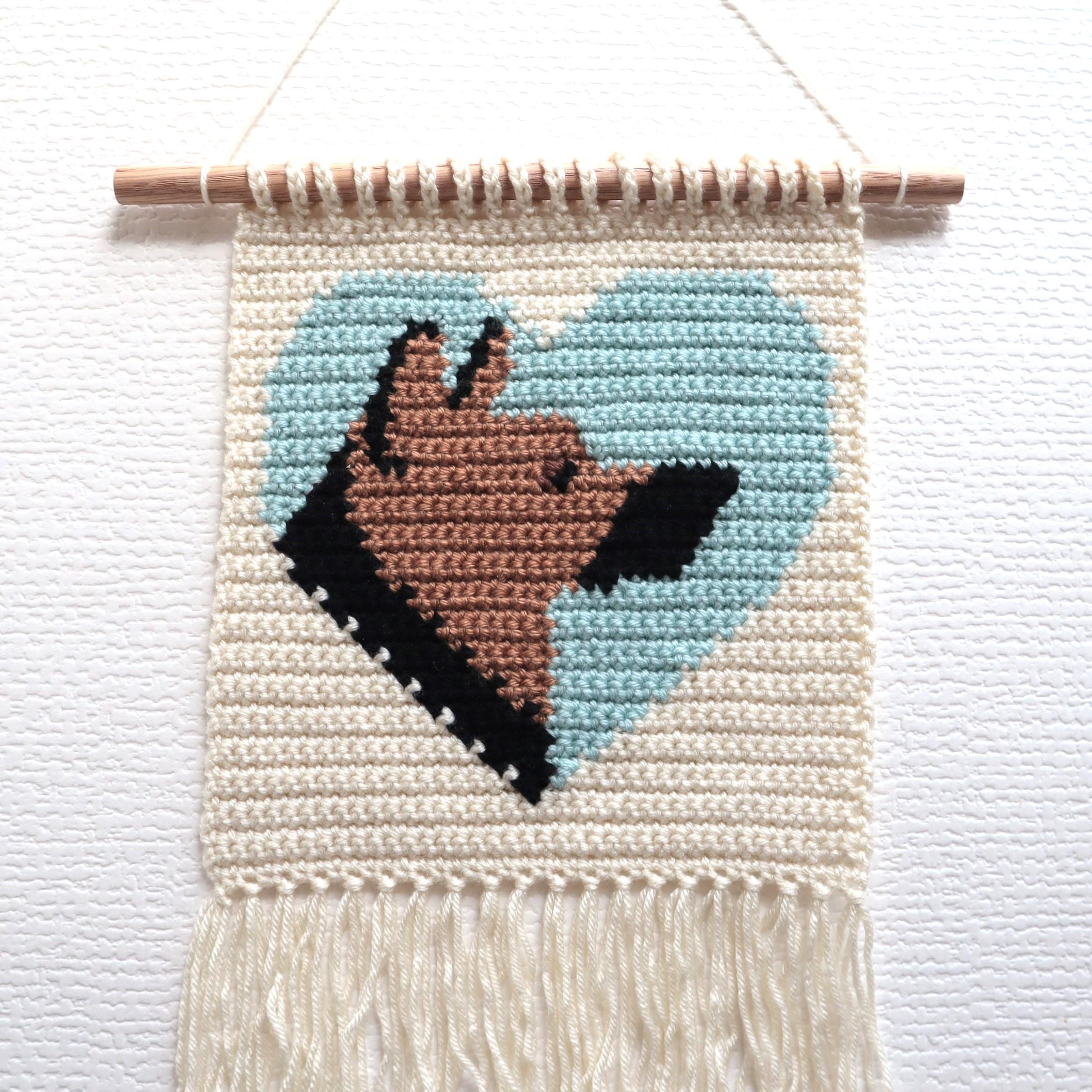 38 German Shepherd Crochet Patterns for Amigurumi, Decor, and Dog Lover Gifts 14 German Shepherd Crochet Pattern: Dog & Heart Wall Hanging