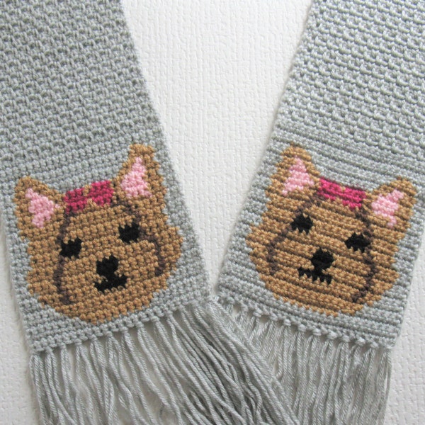 Yorkie dog scarf crochet pattern.  Crocheted instructions to make this Yorkshire terrier wearing berry pink bows.  Pet lovers crochet