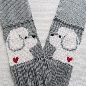 Bichon Frise scarf. Gray knit scarf with white Bichon dogs and small red hearts. Gift for dog lover
