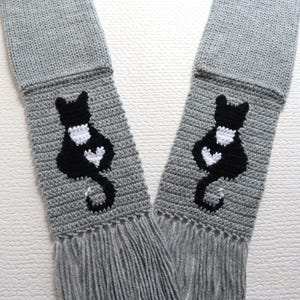 Tuxedo Cat Scarf. Handmade, gray knit scarf with minimalist black and white cat silhouettes. Kitty mom gift.