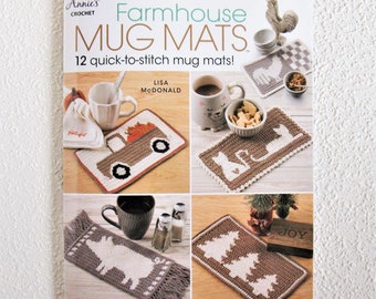 Crochet Mug Mats BOOK. 12 crochet patterns by Lisa McDonald.  Bee, cats, chickens, trees, truck, sheep, dragonfly, hearts and coffee cups