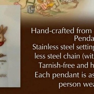 May include: A pendant featuring a Bunnykins design, crafted from vintage china. It has a stainless steel setting and an 18-inch stainless steel chain. The pendant is tarnish-free and hypoallergenic.