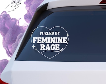 Funny Feminist Bumper Sticker | “Fueled by Feminine Rage” | Heart Design | Permanent Vinyl Decal | Car Windows, Cups, Laptops