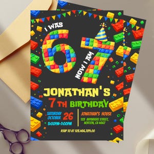 May include: A black birthday invitation with colorful block-style numbers and text. The invitation reads "I WAS 6, NOW I AM 7" and includes the name "Jonathan's" and the date, time, and location of the party.