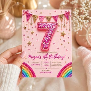 May include: Pink birthday invitation with a large, glitter-filled number seven. The card features a rainbow, gold stars, and text that reads "Megan's 7th Birthday!" with event details. A hand holds the invitation.