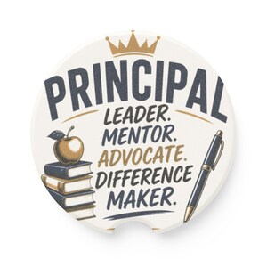 May include: A round ceramic car coaster with a white background featuring a gold crown icon and the text PRINCIPAL LEADER. MENTOR. ADVOCATE. DIFFERENCE MAKER. The design includes a stack of four books topped with a golden apple and a black ballpoint pen.