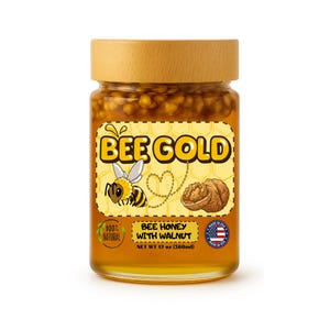 May include: A glass jar of Bee Gold honey with a wooden lid. The label features a cartoon bee, a walnut, and the text "BEE HONEY WITH WALNUT". The jar contains 360ml of honey and is labeled "100% NATURAL".