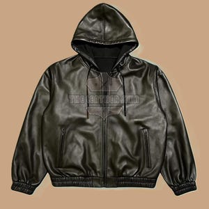 May include: Black leather hooded jacket with a zip closure and two front pockets. The jacket features a drawstring hood and a ribbed hem and cuffs. The text "THE LEATHER SKIN" is visible on the front.